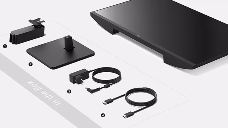 Основание стойки, адаптер + кабель питания и HDMI кабель в коробке.